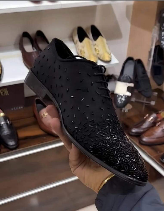 Black crystal inlaid leather shoes